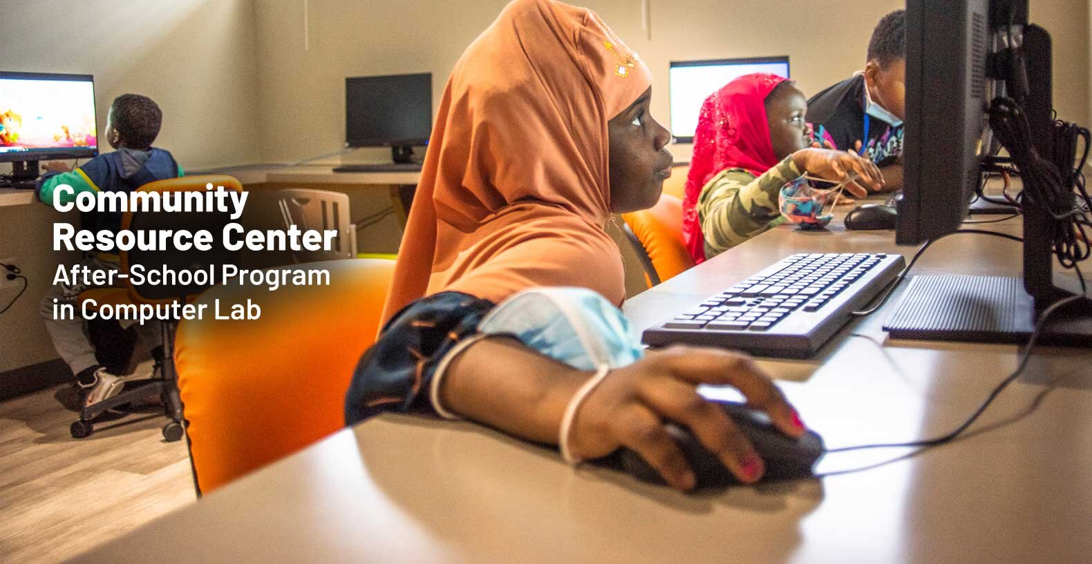 Children using computers at Community Resource Center After-School in Computer Lab