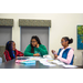 A teacher listening to a girl talk