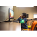 A boy looking at a computer screen