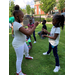 two girls playing rock paper scissors