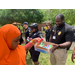 boy getting a popsicle from an officer