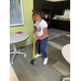 little girl sweeping 
