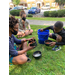 three children helping with gardening