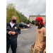 Police officer talking to a boy