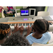kids playing the piano