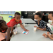 children sitting around a table