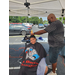 barber giving a boy a haircut