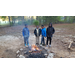 group of boys next to a camp fire