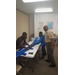 boy scouts playing with toy cars