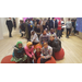 group of kids sitting on bean bag chairs