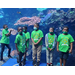 group of boys in front of an aquarium