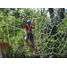 a boy climbing ropes