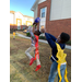 Boy jumping up to catch a football
