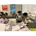 Youth creating vision boards on wellness